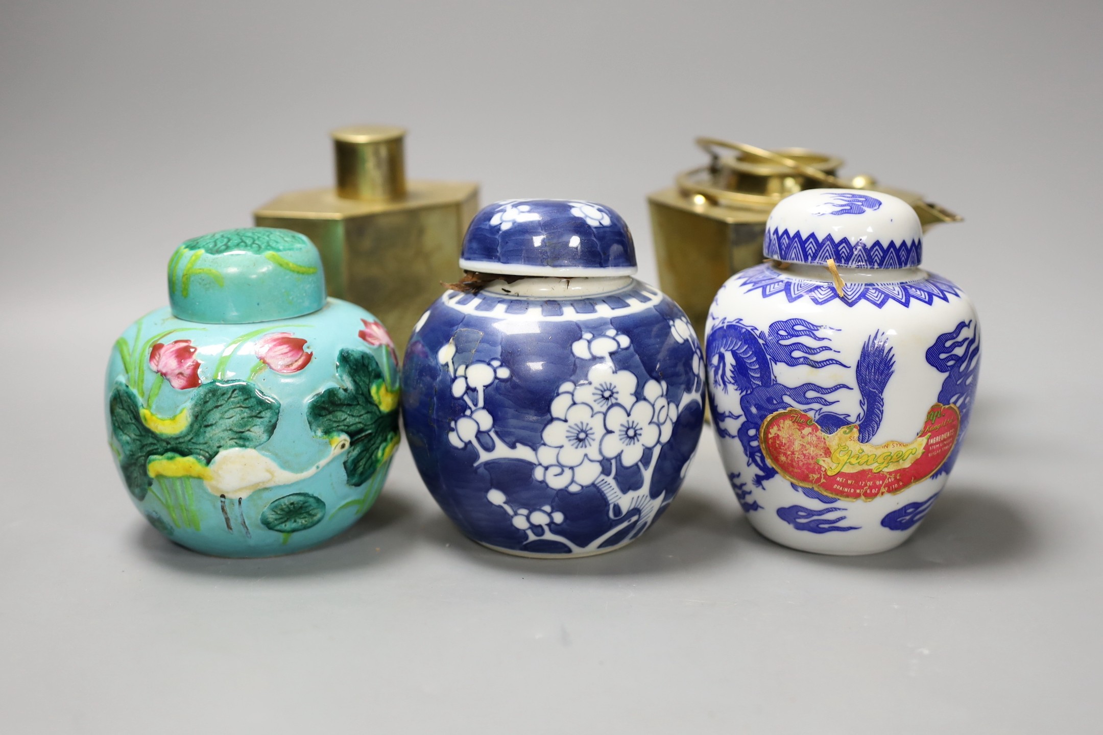 A Chinese brass tea caddy and kettle together with three similar blue and white porcelain bowls, three jars and covers and a Japanese vase